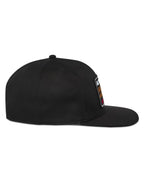 Alpinestars Intuitive Snapback Hat, Black, side profile view, featuring a flat bill and structured crown, embroidered logo patch on the front, casual motorsport-inspired headwear