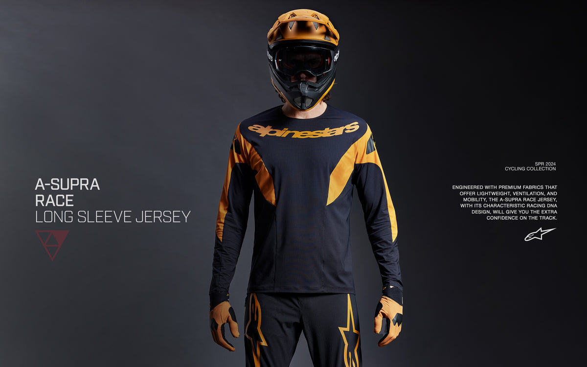 Alpinestars A-Supra Race Jersey, men's long sleeve MTB racing jersey in black and orange with breathable fabric.