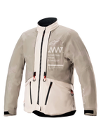 Alpinestars AMT-10LAB Drystar XF Jacket, men's adventure touring motorcycle jacket in white sand and aluminum camo, front view showing waterproof textile rain configuration and branded chest graphics