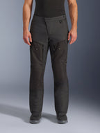 Alpinestars Cusco Drystar® Pants, Adventure Motorcycle Pants, Black, front view, featuring zippered thigh ventilation and adjustable waist, durable ripstop and 600D textile construction, worn with black boots