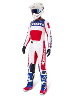 Alpinestars Limited Edition Techstar Fortitude Pants, Motocross gear set, Red White and Blue, worn with matching jersey, white helmet, blue goggles, and blue and red boots, coordinated professional racing outfit for off-road competition