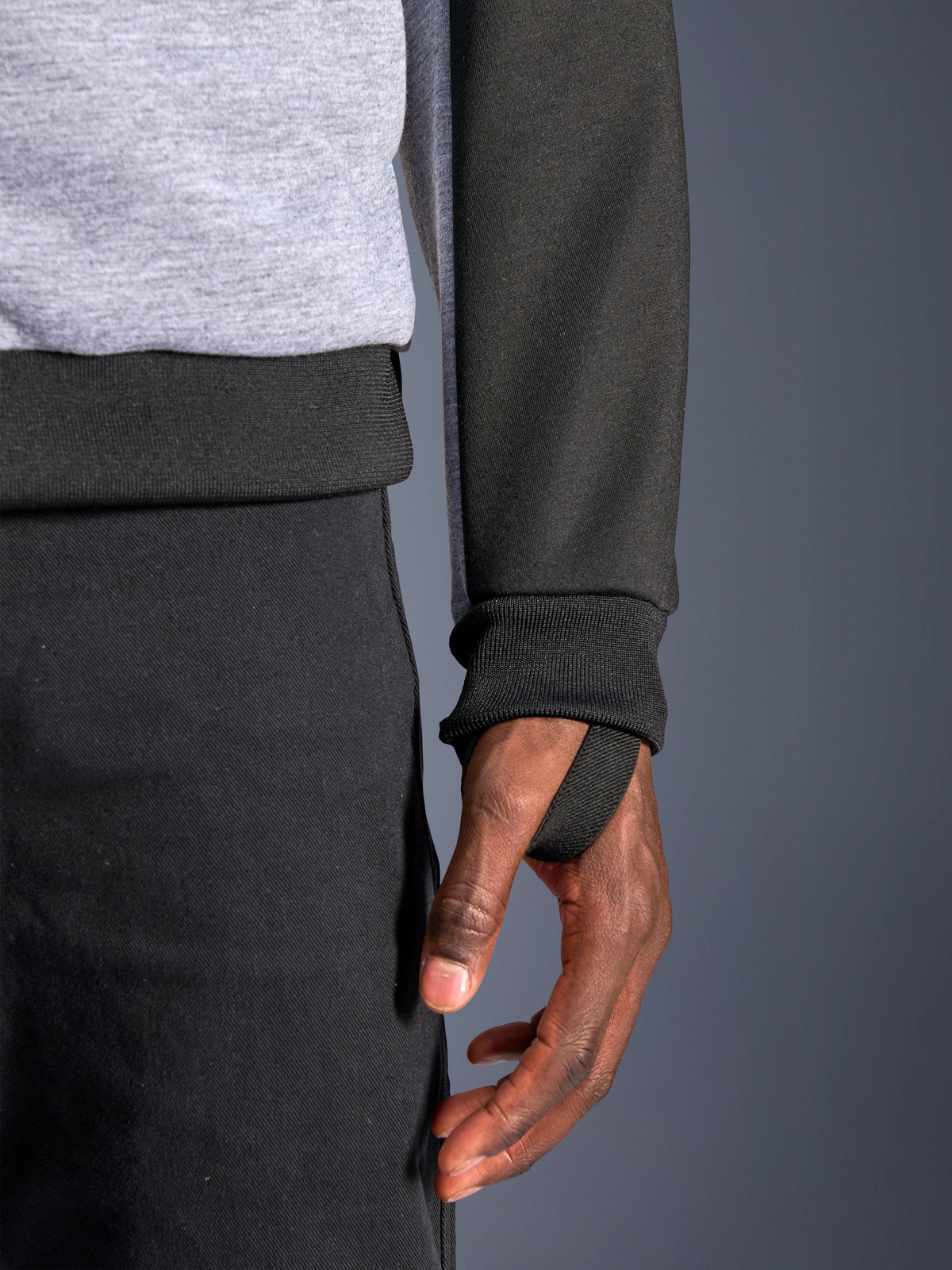 Alpinestars Chrome V2 Sport Hoodie, urban motorcycle jacket, gray and black tech fleece featuring a cuff thumb loop.