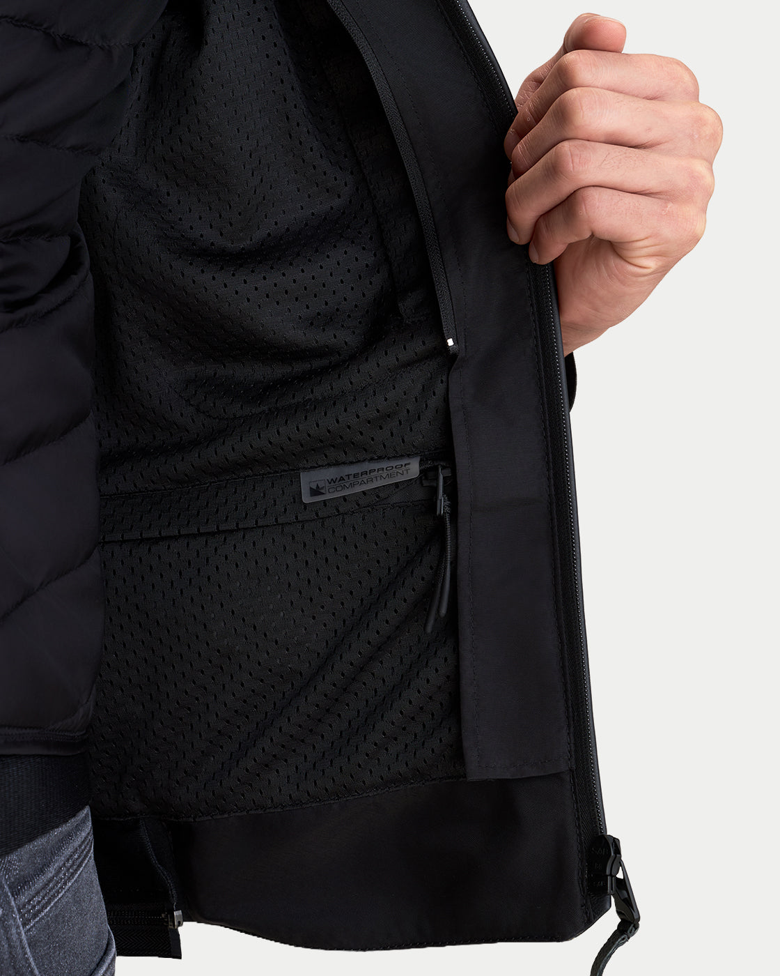 Alpinestars Caliber V2 Leather Jacket, close-up interior view showing mesh lining and waterproof compartment pocket, black, technical motorcycle riding apparel