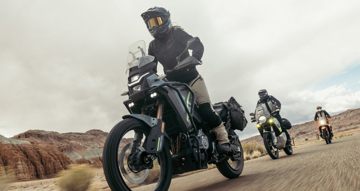 Alpinestars Stella Explore AST and Flex-AST brown textile adventure pants for women's desert motorcycle touring.