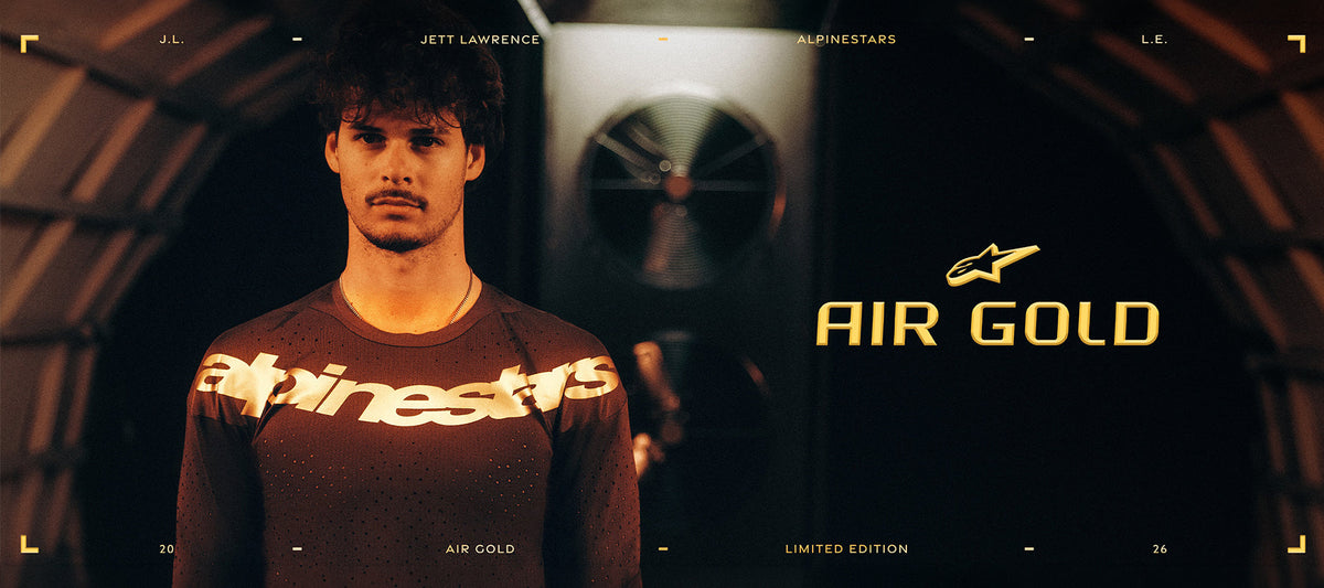 Jett Lawrence wearing Alpinestars Limited Edition Supertech Air Gold Jersey, brown with gold logo for motocross.