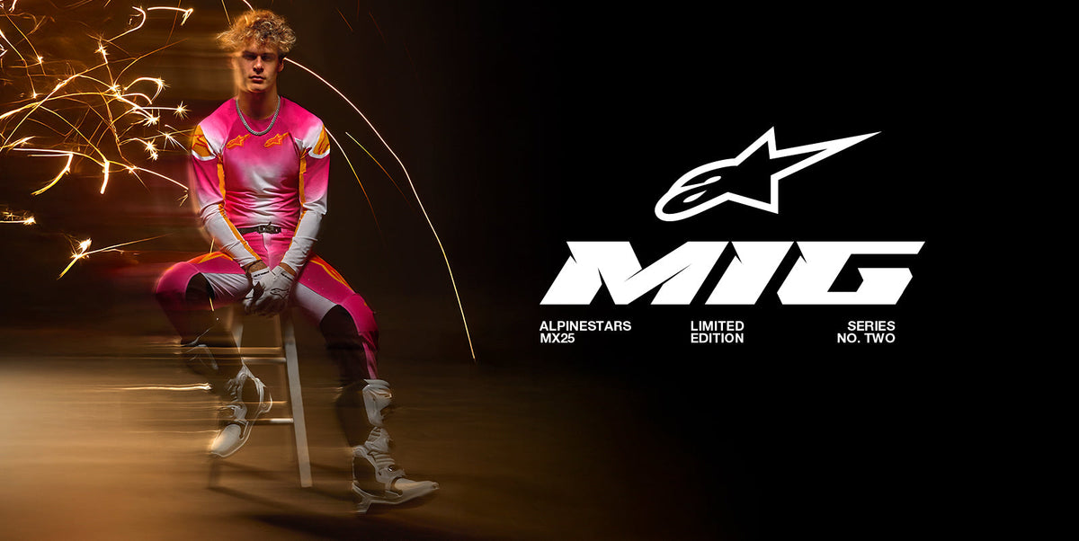 Alpinestars Limited Edition Supertech AFD MIG Jersey and Pants, pink and white motocross racing set worn by a model.