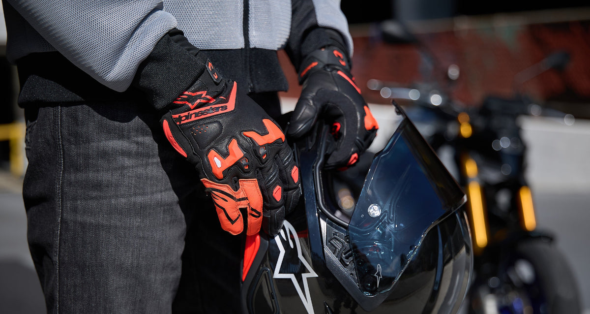 Alpinestars SP-R Tech Gloves, motorcycle racing gloves, black and red leather with MotoGP-derived TPU knuckle protection.