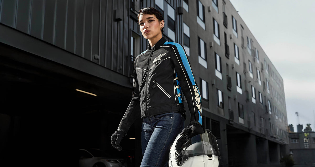 Alpinestars Stella T-Dyno Air Jacket, women's urban motorcycle jacket in black and blue, featuring airflow mesh panels.