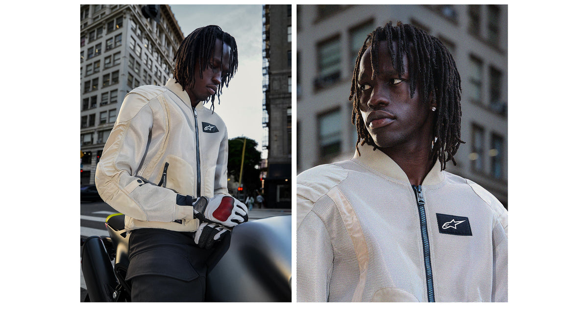 Alpinestars Flight Air Jacket in Aluminum, a men's urban mesh motorcycle jacket shown on-model in a city setting.