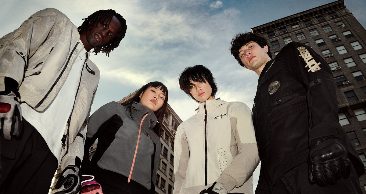 Alpinestars Stella Radium Tech Hoodie AND Radium Tech Hoodie, urban motorcycle gear, gray and black, on models in city.