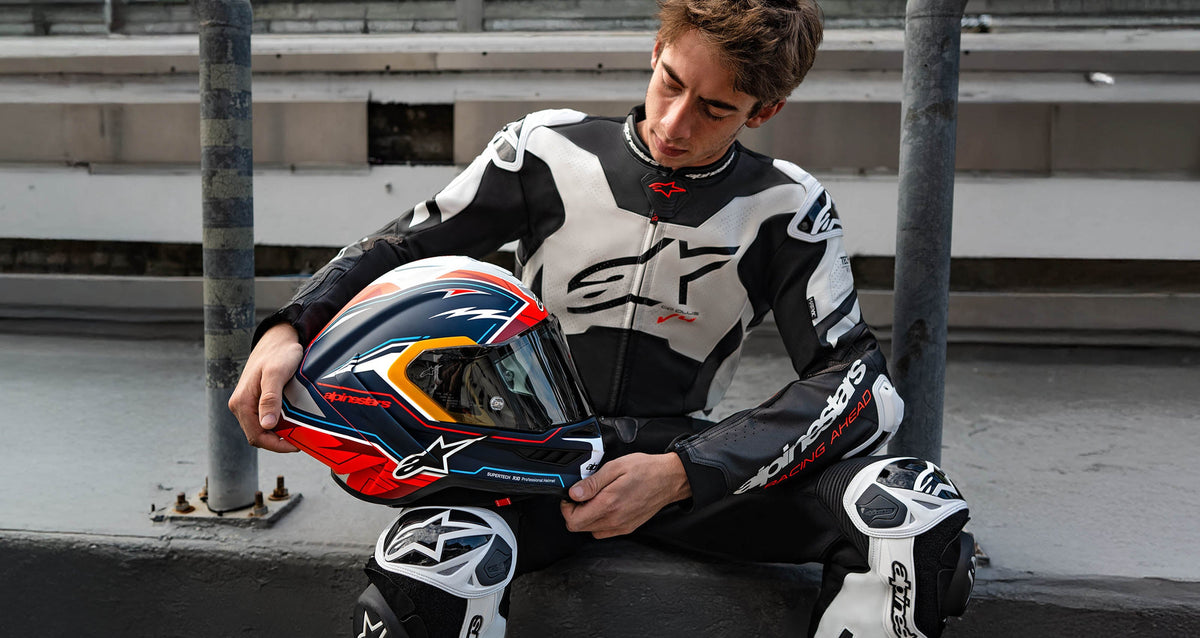 Alpinestars Supertech R10 Acosta Limited Edition Helmet, racing motorcycle helmet, blue and red, carbon fiber construction.
