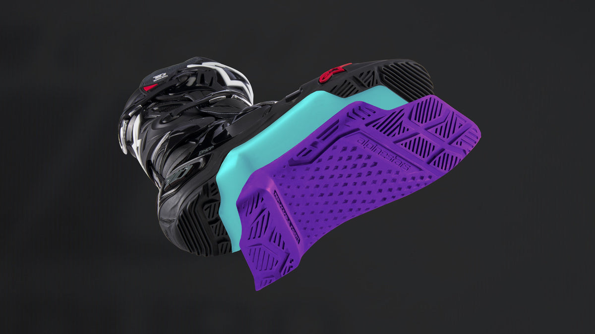 Alpinestars Tech 10 Enduro Boots, off-road racing sole detail, purple and teal high-grip tread for motocross performance.
