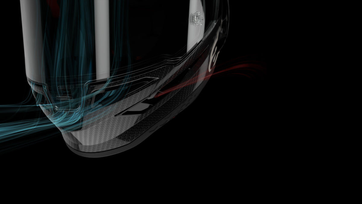 Alpinestars carbon fiber motorcycle racing helmet, featuring aerodynamic airflow visualization with blue and red lines over the black chin bar and clear visor.