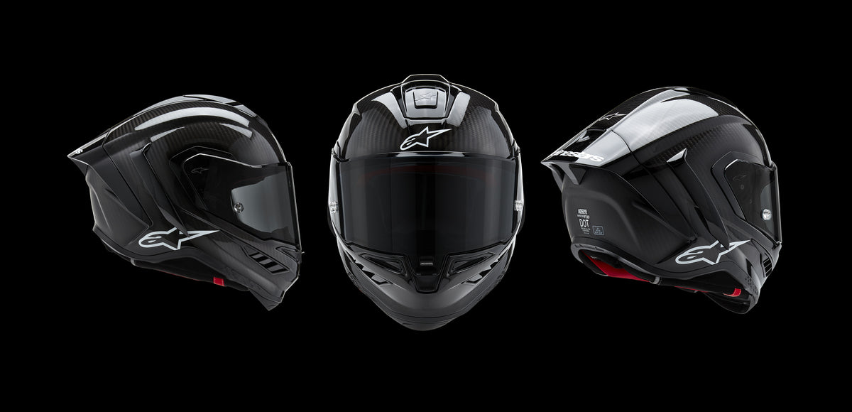 Alpinestars Supertech R10 Helmet, black carbon fiber motorcycle racing helmet with white logos and DOT certification, shown in three views.
